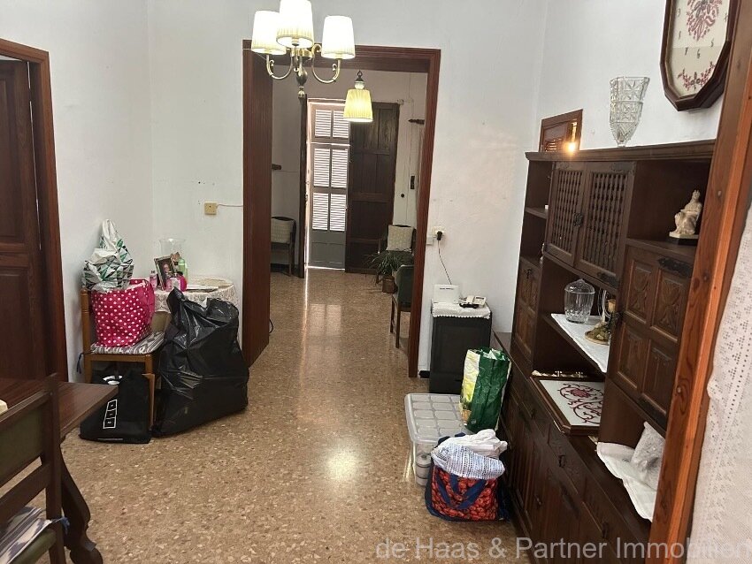 Centrally located townhouse in need of renovation with patio and roof terrace