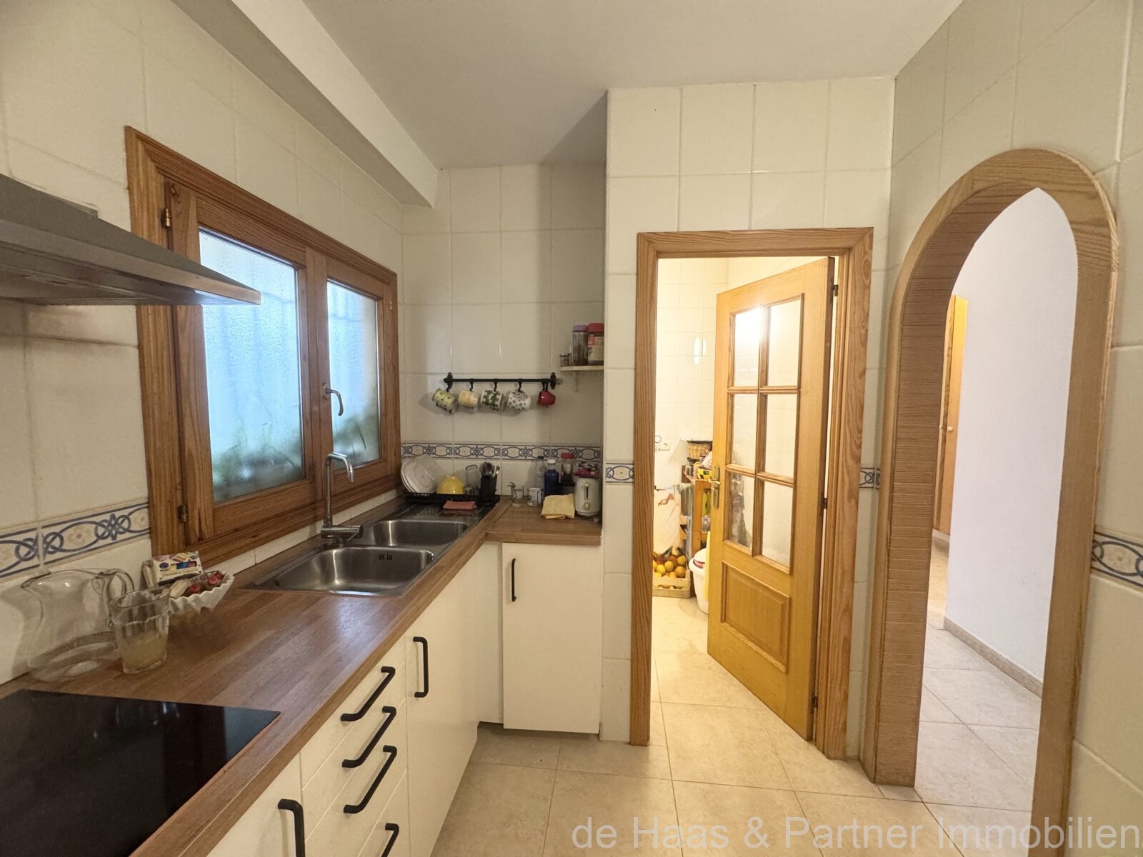 Elegante piso en planta baja con terraza y plaza de aparcamiento propia