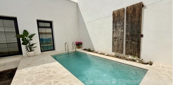 Sant Lorenç: Casa adosada con un patio estupendo, piscina y azotea en una zona tranquila 